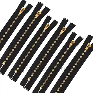 Svart och guld blixtlås